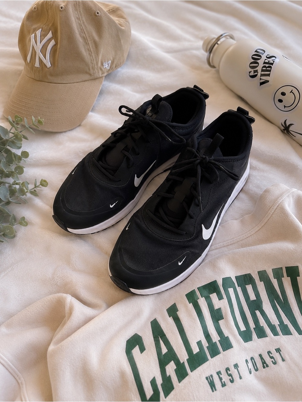 Nike Black Sneakers with White Swoosh Accents